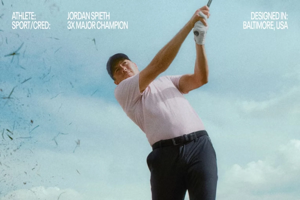 UNDER ARMOUR GOLFのゴルフウェアを着用したモデル